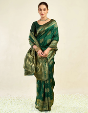 Enchanting Bottle Green Banarasi Silk Saree with Tree Motif Zari Weaving