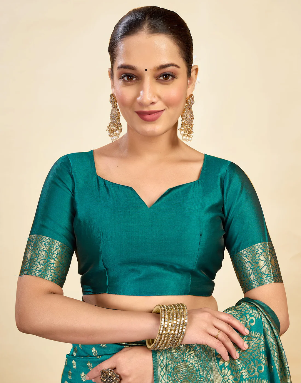 Majestic Teal Banarasi Silk Saree with Golden Zari Weaving