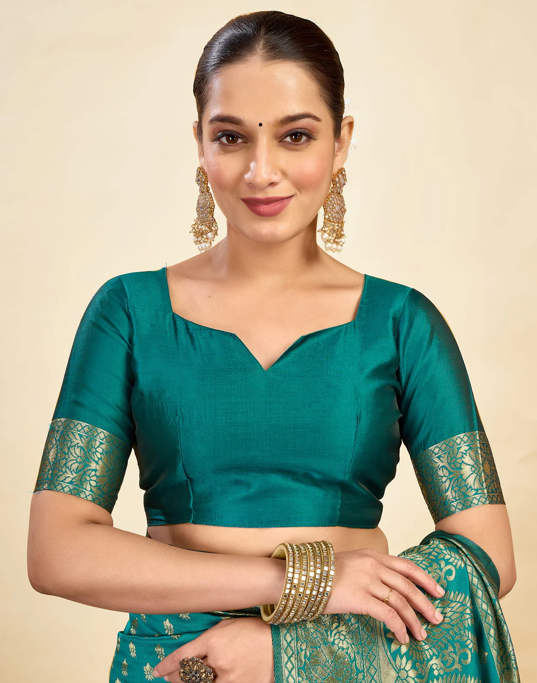 Majestic Teal Banarasi Silk Saree with Golden Zari Weaving