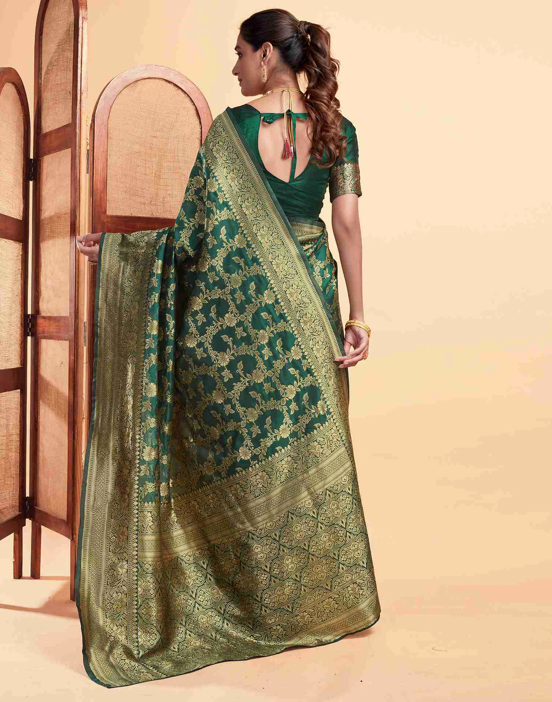 Regal Bottle Green Banarasi Silk Saree with Intricate Zari Weave