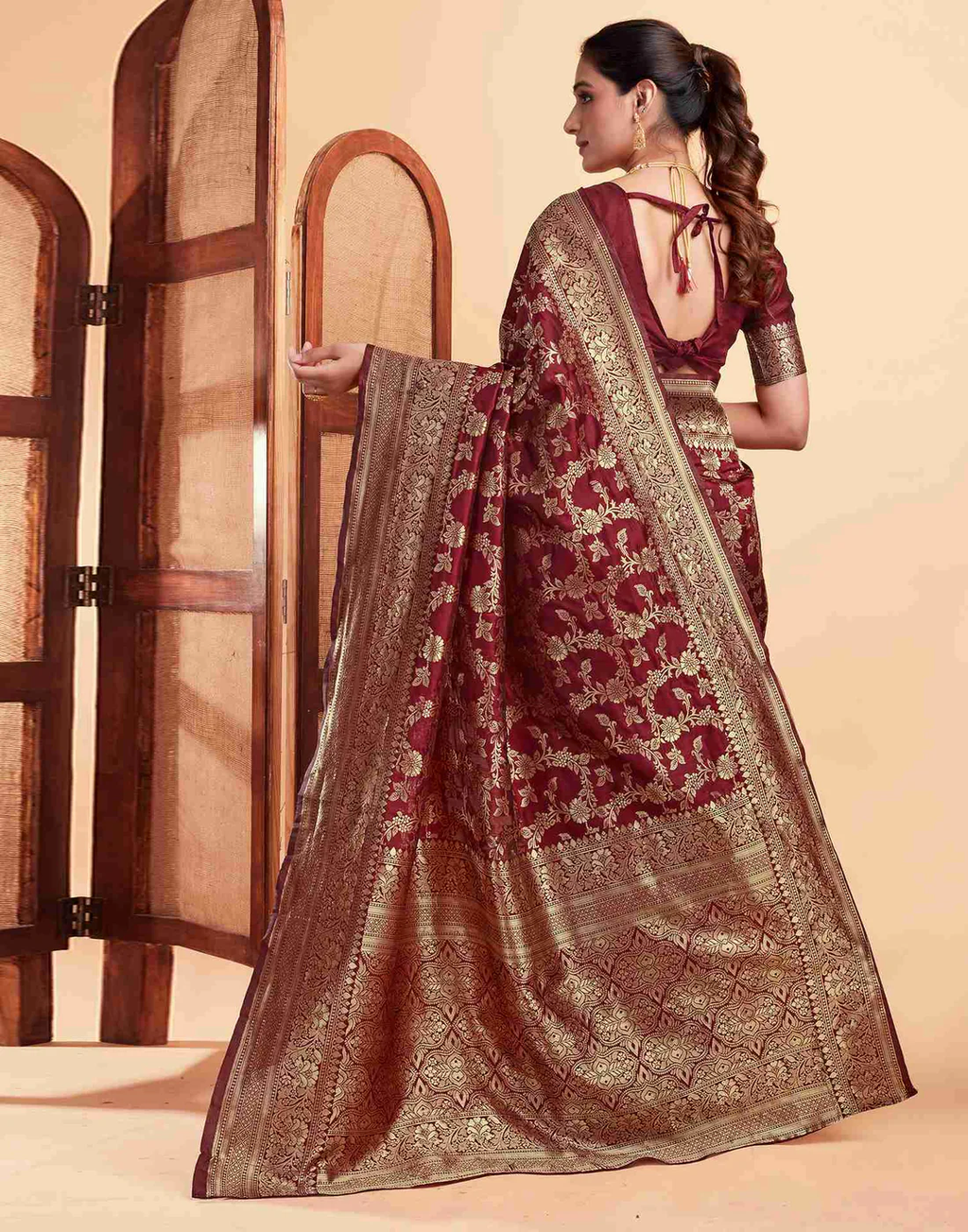 Regal Maroon Banarasi Silk Saree with Intricate Zari Weave
