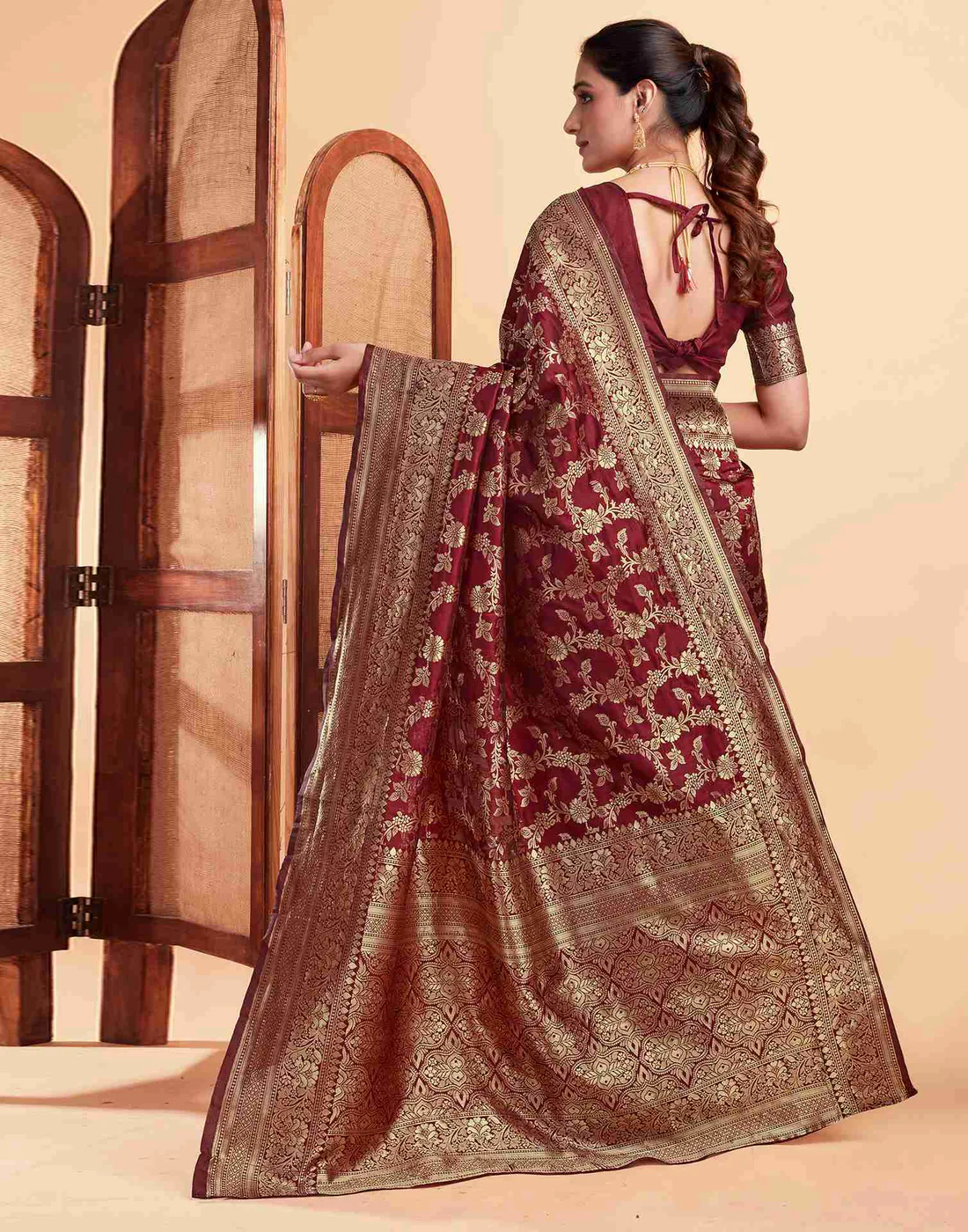 Regal Maroon Banarasi Silk Saree with Intricate Zari Weave