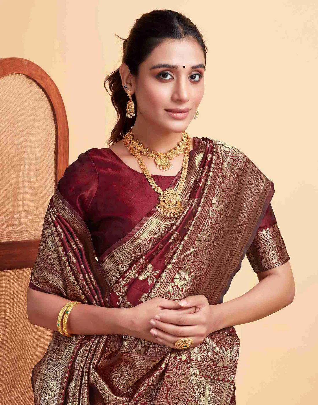 Regal Maroon Banarasi Silk Saree with Intricate Zari Weave