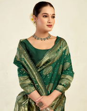 Enchanting Bottle Green Banarasi Silk Saree with Tree Motif Zari Weaving