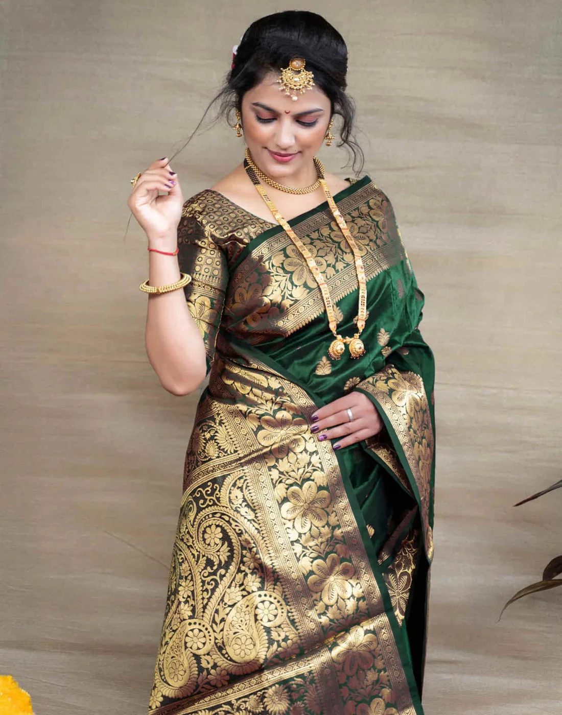 Regal Bottle Green Banarasi Silk Saree with Golden Zari Weaving