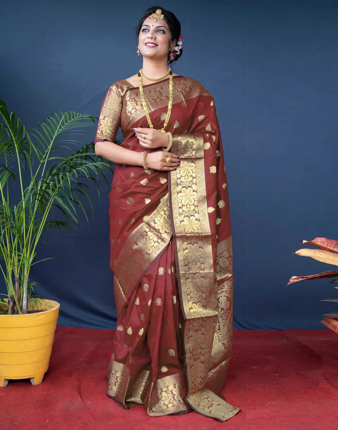 Rich Maroon Banarasi Silk Saree with Luxurious Golden Zari Weaving