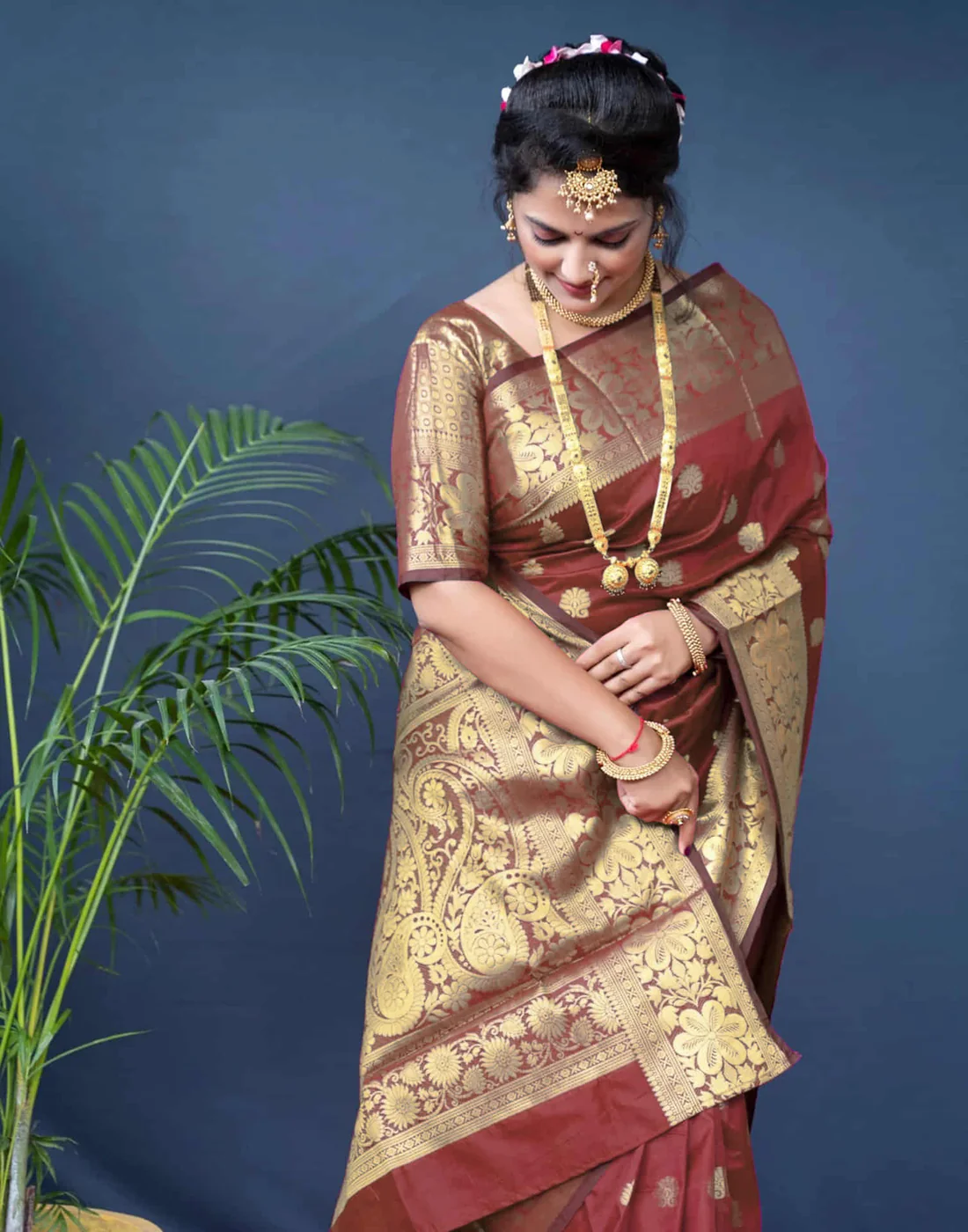 Rich Maroon Banarasi Silk Saree with Luxurious Golden Zari Weaving