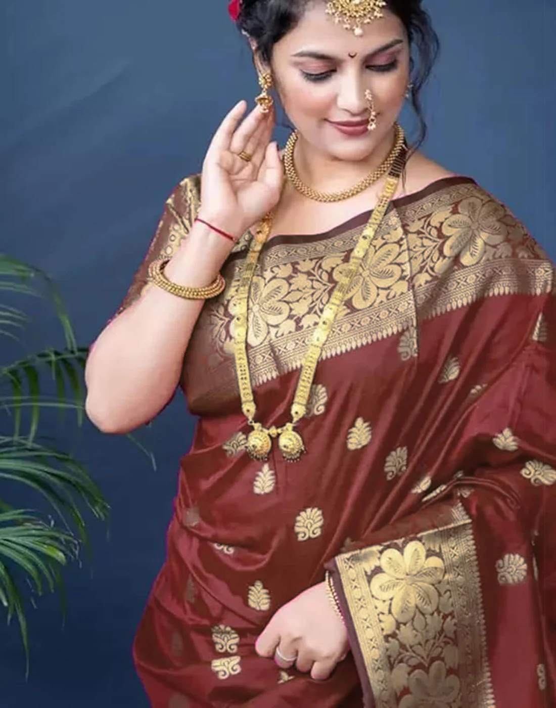 Rich Maroon Banarasi Silk Saree with Luxurious Golden Zari Weaving