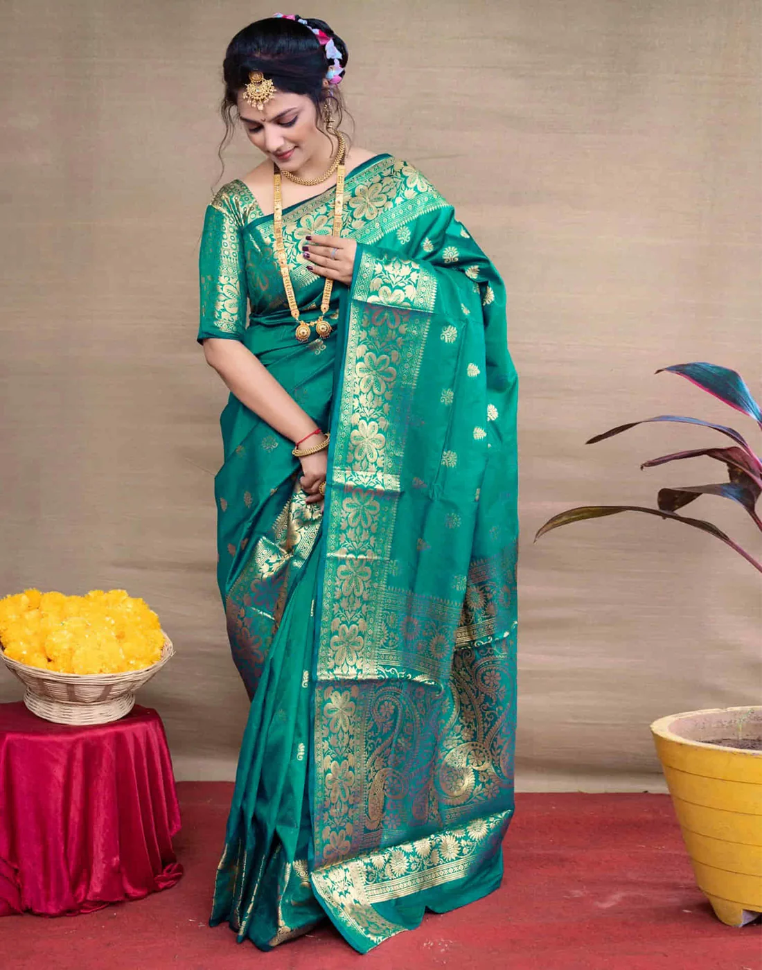 Exquisite Teal Green Banarasi Silk Saree with Opulent Golden Zari Weaving
