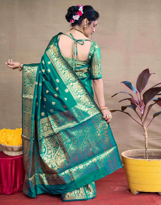 Exquisite Teal Green Banarasi Silk Saree with Opulent Golden Zari Weaving
