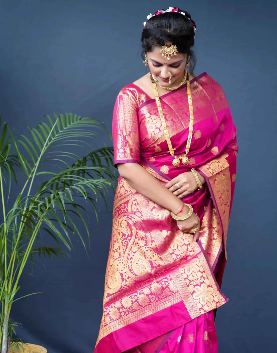 Vibrant Rani Pink Banarasi Silk Saree with Luxurious Golden Zari Weaving