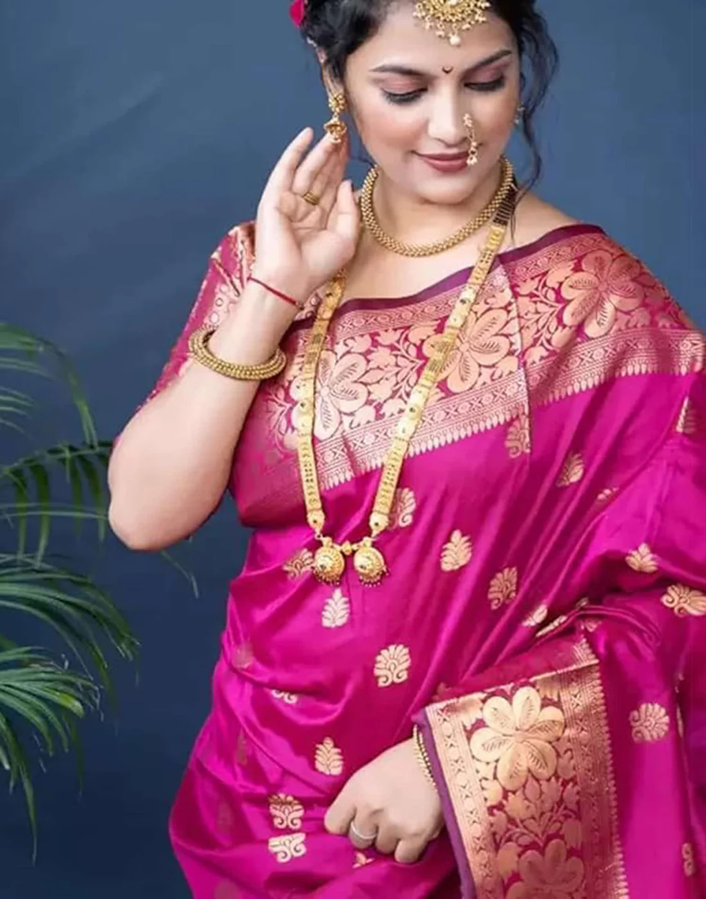 Vibrant Rani Pink Banarasi Silk Saree with Luxurious Golden Zari Weaving