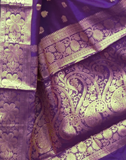 Opulent Wine Banarasi Silk Saree with Luxurious Golden Zari Weaving