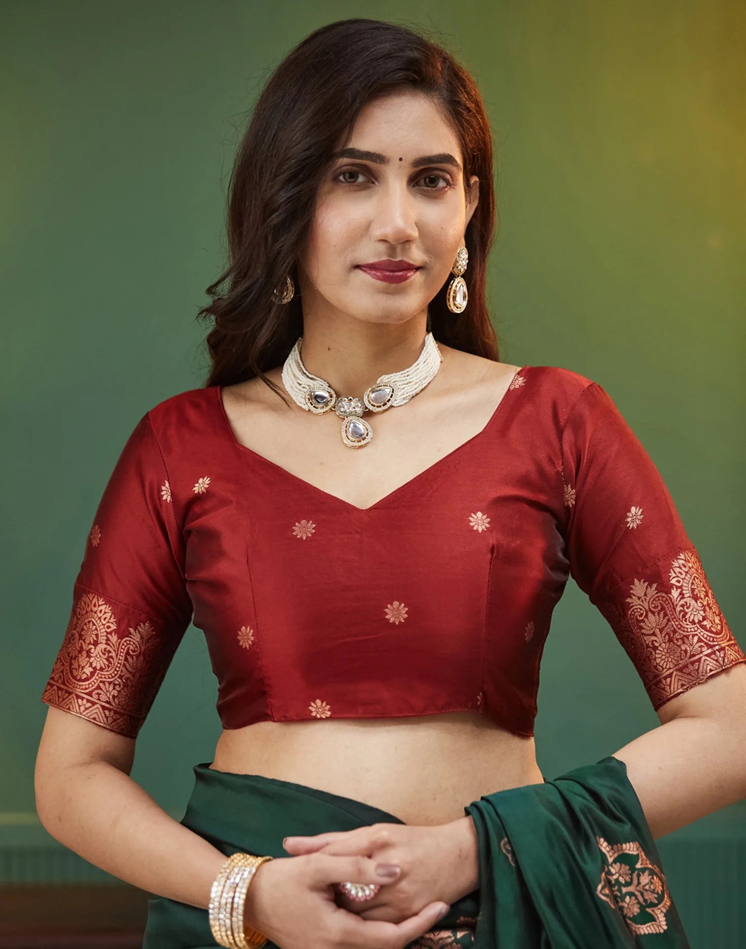 Emerald Green Silk Saree with Rich Maroon Zari Pallu & Floral Weaving